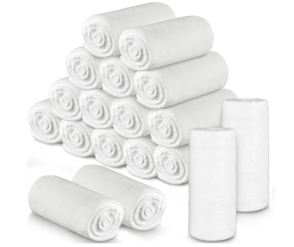 A stack of white paper towels next to rolls.